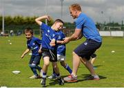 18 August 2015; Leinster rugby players Aaron Dundon and James Tracy visited the Bank of Ireland Summer Camp in North Kildare RFC  for a Q&A session, autograph signings, and a few games on the pitch. North Kildare RFC, Kilcock, Co. Kildare. Picture credit: Seb Daly / SPORTSFILE