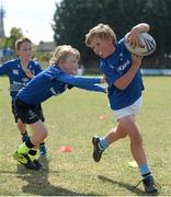 18 August 2015; Leinster rugby players Jamie Hagan and Tom Denton visited the Bank of Ireland Summer Camp in Clontarf FC for a Q&A session, autograph signings, and a few games on the pitch. Clontarf FC, Castle Avenue, Dublin. Picture credit: Sam Barnes / SPORTSFILE