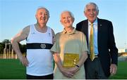 18 August 2015; Tommy Hayward, centre, a long-time Donore Harriers member, pictured with Frank Greally, left, after being presented with Ronnie Delany's book &quot;Staying The Distance&quot; from Ronnie Delany, right, Irish Olympic 1500m gold medallist. Frank Greally's Gratitude Run. Morton Stadium, Dublin.  Picture credit: Cody Glenn / SPORTSFILE