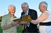 18 August 2015; Tommy Hayward, left, a long-time Donore Harriers member, is presented with Ronnie Delany's book &quot;Staying The Distance&quot; from Ronnie Delany, Irish Olympic 1500m gold medallist, centre, alongside Frank Greally, right. Frank Greally's Gratitude Run. Morton Stadium, Dublin.  Picture credit: Cody Glenn / SPORTSFILE