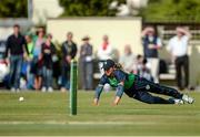 19 August 2015; Elena Tice, Ireland, dives to stop the ball against Austrailia. Women's Twenty20 International, Ireland v Australia. YMCA CC, Sandymount, Dublin. Picture credit: Sam Barnes / SPORTSFILE