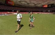 21 August 2015; Irish athletes Brian Murphy, a member of the 4x400m relay team, and Ciara Everard, women's 800m event, walk around the stadium ahead of the IAAF World Track & Field Championships at the National Stadium, Beijing, China. Picture credit: Stephen McCarthy / SPORTSFILE