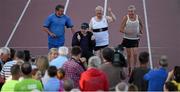 18 August 2015; Neil Cusack, from left, Ray McBride and Ron Hill, right,l with Frank Greally, who set a record for the 10,000M 45 years ago on this day, pictured as he crosses the finish line after running around Morton Stadium for 30.17 - the record time set on the night. Frank Greally's Gratitude Run. Morton Stadium, Dublin Picture credit: Ray McManus / SPORTSFILE