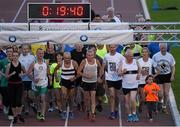 18 August 2015; Athletes including Emma Campbell, Bobby King, Des McGann, Ron Hill, David Carrie, Catherina McKiernan, Maurice Ahern and Hayleigh Bone run with Frank Greally, who set a record for the 10,000M 45 years ago on this day, pictured as he runs around Morton Stadium for 30.17 - the record time set on the night. Frank Greally's Gratitude Run. Morton Stadium, Dublin Picture credit: Ray McManus / SPORTSFILE