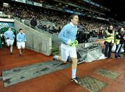 31 January 2009; Dublin's Conal Keaney runs out, while wearing a Dublin 'retro playing kit', onto the pitch before the start of the game. Allianz National Football League, Division 1, Round 1, Dublin v Tyrone, Croke Park, Dublin. Picture credit: Brendan Moran / SPORTSFILE