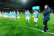 31 January 2009; Dublin manager Pat Gilroy speaks to his players, as they wear Dublin 'retro playing kit', while waiting on the Tyrone team before the start of the game. Allianz National Football League, Division 1, Round 1, Dublin v Tyrone, Croke Park, Dublin. Picture credit: Brendan Moran / SPORTSFILE