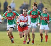 1 February 2009; Gerard O Keane, Derry, in action against Billy Joe Padden and Ronan McGarrity, Mayo. Allianz National Football League, Division 1, Round 1, Mayo v Derry, James Stephen's Park, Ballina, Co. Mayo. Picture credit: Ray Ryan / SPORTSFILE