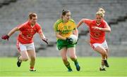 22 August 2015; Geraldine McLaughlin, Donegal, in action against Caoimhe Morgan, left, and Sinéad McCleary, Armagh. TG4 Ladies Football All-Ireland Senior Championship, Quarter-Final, Donegal v Armagh. St Tiernach's Park, Clones, Co. Monaghan. Picture credit: Piaras Ó Mídheach / SPORTSFILE