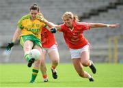 22 August 2015; Geraldine McLaughlin, Donegal, in action against Caoimhe Morgan and Sinéad McCleary, right, Armagh. TG4 Ladies Football All-Ireland Senior Championship, Quarter-Final, Donegal v Armagh. St Tiernach's Park, Clones, Co. Monaghan. Picture credit: Piaras Ó Mídheach / SPORTSFILE