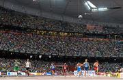 22 August 2015; Athletes during their heat of the Men's 400m Hurdles event cross the finish line. From left, Thomas Barr of Ireland, Yasmani Copello of Turkey, Johannes Hardus Maritz of Namibia, Eric Cray of Philippines, Bershawn Jackson of USA, Ivan Shablyuyev of Russia, Rasmus Magi of Estonia and Wen Cheng of China. IAAF World Athletics Championships Beijing 2015 - Day 1, National Stadium, Beijing, China. Picture credit: Stephen McCarthy / SPORTSFILE