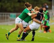 22 August 2015; Ireland's Katie Fitzhenry and Jennifer Murphy tackle Hong Kong's Amelie Odile Marsie Seure. Women's Sevens Rugby Tournament, Pool C, Ireland v Hong Kong. UCD, Belfield, Dublin. Picture credit: Seb Daly / SPORTSFILE