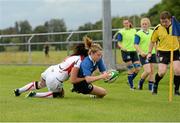 22 August 2015; Amy Cotter, Leinster, goes over for her side's second try despite the tackled by Amy Davis, Ulster. Women's Interprovincial, Ulster v Leinster. RFC, Portadown, Co. Armagh. Picture credit: Oliver McVeigh / SPORTSFILE