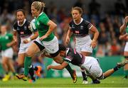 22 August 2015; Alison Miller, Ireland, skips through a tackle from Pou Fan Lai, Hong Kong. Women's Sevens Rugby Tournament, Pool C, Ireland v Hong Kong. UCD, Belfield, Dublin. Picture credit: Seb Daly / SPORTSFILE