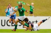 22 August 2015; Alison Miller, Ireland, on her way to scoring a try despite the attention of Pak Yan Poon, Hong Kong. Women's Sevens Rugby Tournament, Pool C, Ireland v Hong Kong. UCD, Belfield, Dublin. Picture credit: Seb Daly / SPORTSFILE