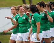 22 August 2015; Ireland players smile as they leave the pitch after their victory over Hong Kong. Women's Sevens Rugby Tournament, Pool C, Ireland v Hong Kong. UCD, Belfield, Dublin. Picture credit: Seb Daly / SPORTSFILE