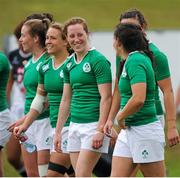 22 August 2015; Ireland players smile as they leave the pitch after their victory over Hong Kong. Women's Sevens Rugby Tournament, Pool C, Ireland v Hong Kong. UCD, Belfield, Dublin. Picture credit: Seb Daly / SPORTSFILE