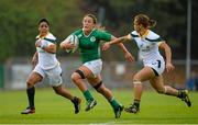 22 August 2015; Ashleigh Baxter, Ireland, races clear of Zenay Jordaan, left, and Mathrin Simmers, South Africa. Women's Sevens Rugby Tournament, Pool C, Ireland v South Africa. UCD, Belfield, Dublin. Picture credit: Brendan Moran / SPORTSFILE