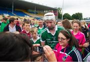 22 August 2015; Cian Lynch, Limerick, celebrates with supporters after the game. Bord Gáis Energy GAA Hurling All Ireland U21 Championship, Semi-Final, Limerick v Antrim. Semple Stadium, Thurles, Co. Tipperary. Picture credit: Dáire Brennan / SPORTSFILE