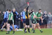 4 February 2009; Referee Pauric Hughes issues Paul Courtney, Queen's University, a straight red card for a second half incident. Sigerson Cup, Queen's University v University of Ulster Jordanstown, The Dub, Belfast. Picture credit: Oliver McVeigh / SPORTSFILE