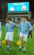 31 January 2009; Dublin players Paul Casey and Ciaran Whelan warm-up wearing 'retro playing kit' while waiting on the Tyrone team to come out onto the pitch. Allianz National Football League, Division 1, Round 1, Dublin v Tyrone, Croke Park, Dublin. Picture credit: Brendan Moran / SPORTSFILE