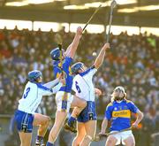 8 February 2009; John O'Brien, Tipperary, in action against Eoin Murphy, 3, and Michael Walsh, 6, Waterford. Allianz GAA National Hurling League, Division 1, Round 1, Waterford v Tipperary, Walsh Park, Waterford. Picture credit: Matt Browne / SPORTSFILE