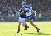 8 February 2009; John O'Brien, Tipperary, is tackled by Declan Prendergast, Waterford. Allianz GAA National Hurling League, Division 1, Round 1, Waterford v Tipperary, Walsh Park, Waterford. Picture credit: Matt Browne / SPORTSFILE