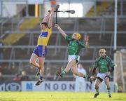 8 February 2009; Diarmuid McMahon, Clare, contests a high ball against Paul Browne, Limerick, as Limerick's David Breen looks on. Allianz GAA National Hurling League, Division 1, Round 1, Limerick v Clare, Gaelic Grounds, Limerick. Picture credit: Brian Lawless / SPORTSFILE