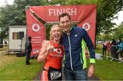 23 August 2015; Anne O’Leary, Vodafone CEO, and David Gillick, Vodafone Dublin City Triathlon Ambassador, were pictured at the finish line at the Vodafone Dublin City Triathlon 2015. Phoenix Park, Dublin. Picture credit: David Maher / SPORTSFILE