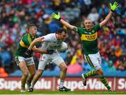 23 August 2015; Cathal McCarron, Tyrone, is tackled by James O’Donoghue, supported by Kieran Donaghy, Kerry,. GAA Football All-Ireland Senior Championship, Semi-Final, Kerry v Tyrone. Croke Park, Dublin. Picture credit: Ramsey Cardy / SPORTSFILE