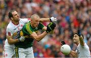 23 August 2015; Kieran Donaghy, Kerry, in action against Justin McMahon and Tiernan McCann, Tyrone. GAA Football All-Ireland Senior Championship, Semi-Final, Kerry v Tyrone. Croke Park, Dublin. Picture credit: Oliver McVeigh / SPORTSFILE