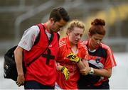 22 August 2015; Aoife McCoy, Armagh, is helped off the field by medics after picking up an injury. TG4 Ladies Football All-Ireland Senior Championship, Quarter-Final, Donegal v Armagh. St Tiernach's Park, Clones, Co. Monaghan. Picture credit: Piaras Ó Mídheach / SPORTSFILE
