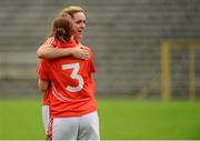 22 August 2015; Armagh's Caroline O'Hanlon celebrates with team-mate Caoimhe Morgan, 3, after the game. TG4 Ladies Football All-Ireland Senior Championship, Quarter-Final, Donegal v Armagh. St Tiernach's Park, Clones, Co. Monaghan. Picture credit: Piaras Ó Mídheach / SPORTSFILE