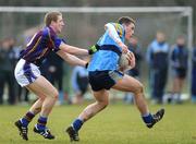 12 February 2009; John O'Loughlin, UCD, in action against Stephen Lonergan, University of Limerick. Sigerson Cup, UCD v University of Limerick. UCD, Belfield, Dublin. Picture credit: Stephen McCarthy / SPORTSFILE