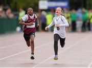 23 August 2015; Diane Izekor, Kinnegad- Coralstown, Co. Westmeath, left, Keeva Flynn, Castleconnor, Co. Sligo, competing in the Girls U8 & O6 80 metres. HSE National Community Games Festival, Weekend 2. Athlone IT, Athlone, Co. Westmeath. Picture credit: Seb Daly / SPORTSFILE
