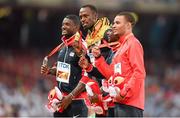 24 August 2015; Silver medalist Justin Gatlin of the United States, gold medalist Usain Bolt of Jamaica and joint bronze medalists Trayvon Bromell of the United States and Andre De Grasse of Canada pose on the podium during the medal ceremony for the Men's 100m event. IAAF World Athletics Championships Beijing 2015 - Day 3, National Stadium, Beijing, China. Picture credit: Stephen McCarthy / SPORTSFILE