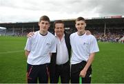 22 August 2015; Éanna, left, and Ronan Murphy, from the Tommy Larkins GAA Club, Co. Galway, with Marty Morrissey after the half time crossbar challenge. Bord Gáis Energy GAA Hurling All Ireland U21 Championship, Semi-Final, Limerick v Antrim. Semple Stadium, Thurles, Co. Tipperary. Picture credit: Dáire Brennan / SPORTSFILE