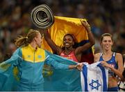24 August 2015; Catherine Ibarguen of Colombia celebrates after winning the final of the Women's Triple Jump alongside second place Hanna Knyazyeva-Minenko of Israel, right, and Olga Rypakova of Kazakhstan. IAAF World Athletics Championships Beijing 2015 - Day 3, National Stadium, Beijing, China. Picture credit: Stephen McCarthy / SPORTSFILE