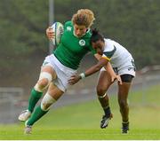 22 August 2015; Jenny Murphy, Ireland, is tackled by Veroeshka Grain, South Africa. Women's Sevens Rugby Tournament, Pool C, Ireland v South Africa. UCD, Belfield, Dublin. Picture credit: Brendan Moran / SPORTSFILE