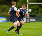 25 August 2015; Ireland's Tadhg Furlong receives a pass from Jamie Heaslip in action during squad training. Ireland Rugby Squad Training. Carton House, Maynooth, Co. Kildare. Picture credit: Seb Daly / SPORTSFILE