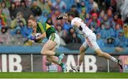 23 August 2015; Ronan McNamee, Tyrone, fouls Colm Cooper, Kerry, for which he received a black card. GAA Football All-Ireland Senior Championship, Semi-Final, Kerry v Tyrone. Croke Park, Dublin. Picture credit: Brendan Moran / SPORTSFILE