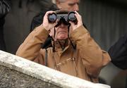 14 February 2009; A race fan keeps a close eye on the day's racing. Gowran Park, Co. Kilkenny. Picture credit: Pat Murphy / SPORTSFILE