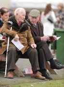 14 February 2009; Race fans discuss the form before the Red Mills Trial Hurdle. Gowran Park, Co. Kilkenny. Picture credit: Pat Murphy / SPORTSFILE
