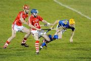 14 February 2009; Shane McGrath, Tipperary, in action against Aidan Ryan and Barry Johnson, right, Cork. Allianz GAA National Hurling League, Division 1 Round 2, Tipperary v Cork. Semple Stadium, Thurles. Picture credit: Pat Murphy / SPORTSFILE