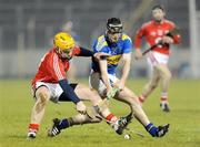14 February 2009; Joe Moran, Cork, in action against Pat Kerwick, Tipperary. Allianz GAA NHL Division 1 Round 2, Tipperary v Cork, Semple Stadium, Thurles. Picture credit: Pat Murphy / SPORTSFILE