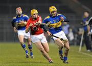 14 February 2009; Pa Bourke, Tipperary, in action against Eoin Keane, Cork. Allianz GAA National Hurling League, Division 1 Round 2, Tipperary v Cork, Semple Stadium, Thurles. Picture credit: Pat Murphy / SPORTSFILE
