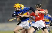 14 February 2009; Pa Bourke, Tipperary, in action against Ray Ryan and Eoin Keane, hidden, Cork. Allianz GAA National Hurling League, Division 1 Round 2, Tipperary v Cork, Semple Stadium, Thurles. Picture credit: Pat Murphy / SPORTSFILE