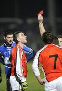14 February 2009; Brendan Quigley, Laois, and Peadar Toal, Armagh, centre, receive red cards from referee Pat Fox. Allianz GAA NFL Division 2 Round 2, Armagh v Laois, Athletic Grounds, Armagh. Picture credit: Oliver McVeigh / SPORTSFILE