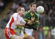 15 February 2009; Aidan Cassidy, Tyrone, in action against Declan O'Sullivan, Kerry. Allianz National Football League, Division 1, Round 2, Tyrone v Kerry, Healy Park, Omagh, Co. Tyrone. Picture credit: Oliver McVeigh / SPORTSFILE