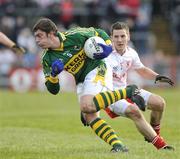 15 February 2009; David Moran, Kerry, in action against Philip Jordan, Tyrone. Allianz National Football League, Division 1, Round 2, Tyrone v Kerry, Healy Park, Omagh, Co. Tyrone. Picture credit: Oliver McVeigh / SPORTSFILE