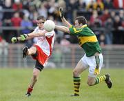 15 February 2009 Tommy McGuigan, Tyrone, in action against Daniel Bohan, Kerry. Allianz National Football League, Division 1, Round 2, Tyrone v Kerry, Healy Park, Omagh, Co. Tyrone. Picture credit: Oliver McVeigh / SPORTSFILE
